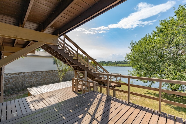 deck featuring a water view