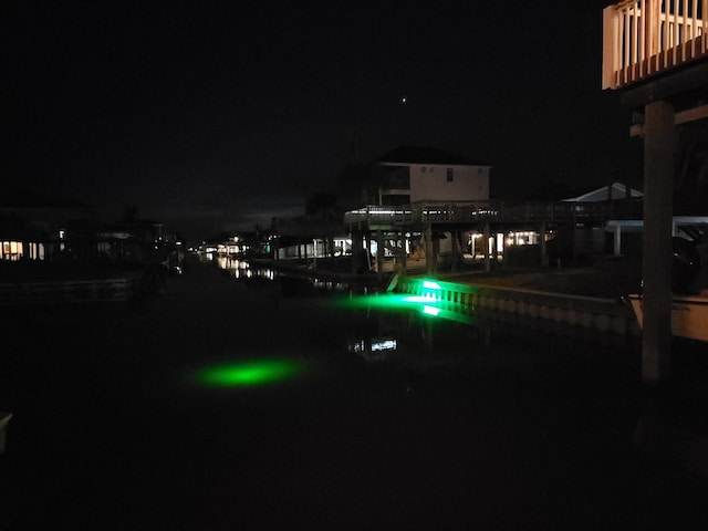 pool at night with a water view