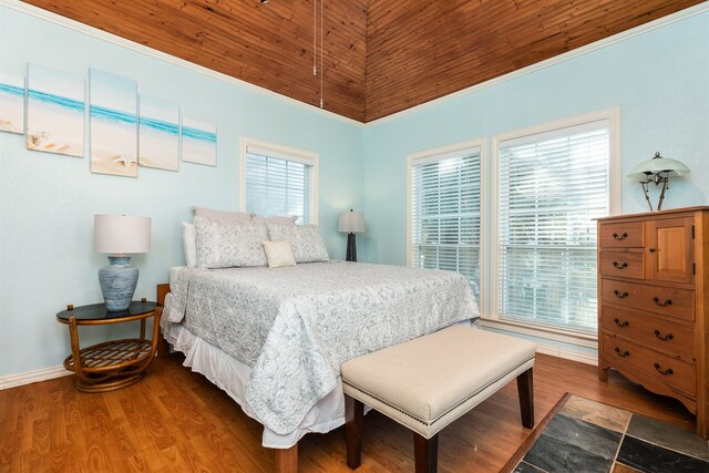 bedroom featuring wood ceiling, high vaulted ceiling, and dark hardwood / wood-style floors