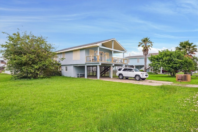 exterior space featuring a yard and a carport