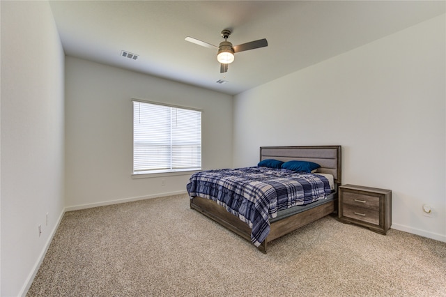 bedroom with light colored carpet and ceiling fan