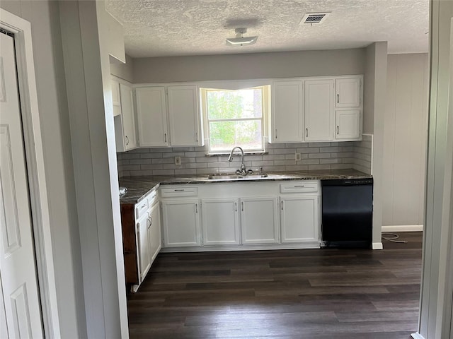 1801 Southline St, Cleveland, TX 77327 - kitchen featuring dishwasher, a sink, dark wood-type flooring, white cabinetry, and a textured ceiling