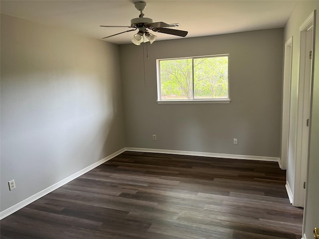 1801 Southline St, Cleveland, TX 77327 - unfurnished bedroom featuring dark wood-type flooring, baseboards, and ceiling fan