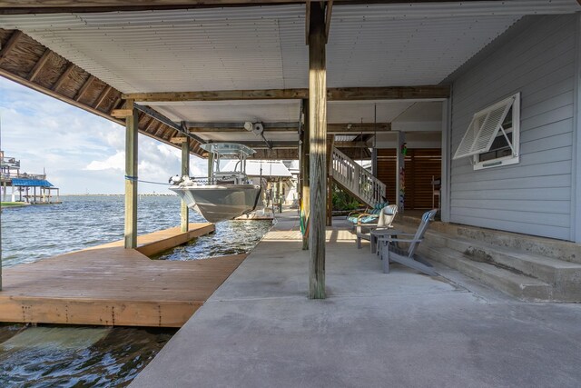 dock area featuring a water view