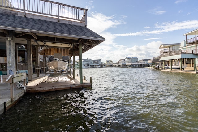 dock area with a water view