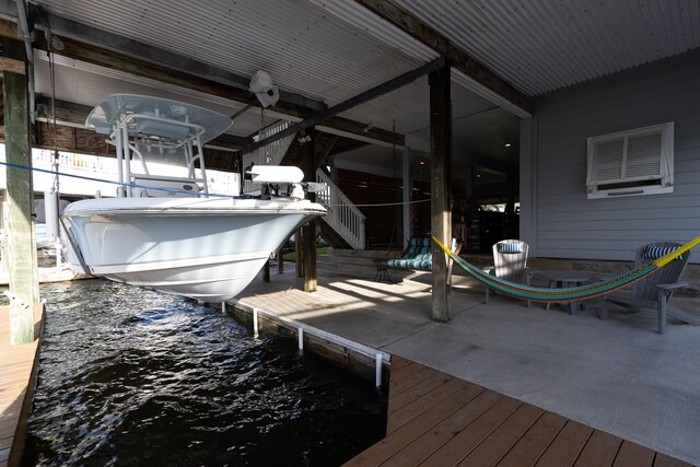 view of dock with a water view