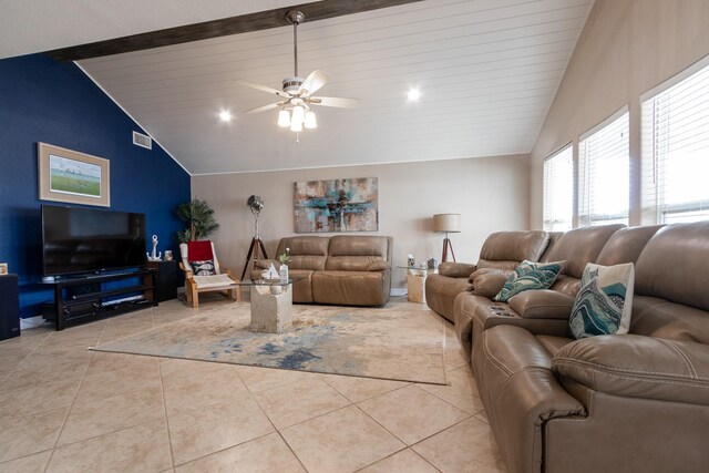 tiled living room with beamed ceiling, ceiling fan, and high vaulted ceiling