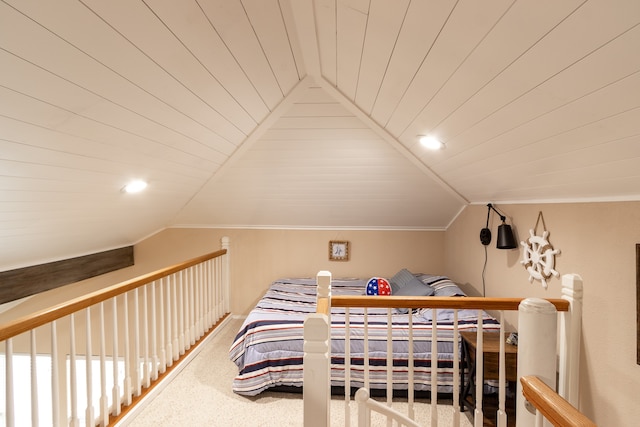 carpeted bedroom featuring wood ceiling, lofted ceiling, and ornamental molding