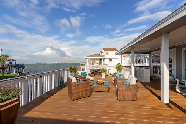 deck featuring a water view