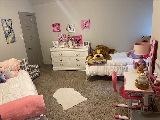 carpeted bedroom featuring vaulted ceiling