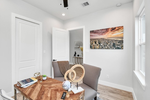 interior space featuring light hardwood / wood-style flooring and ceiling fan