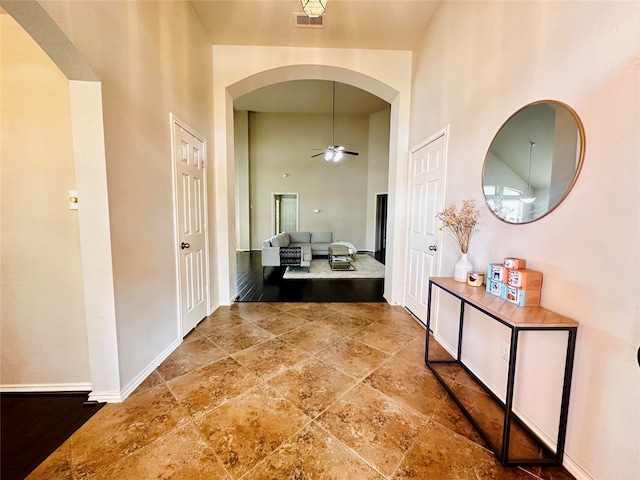 hall with hardwood / wood-style flooring