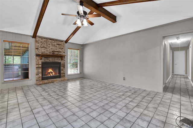 unfurnished living room with vaulted ceiling with beams, a fireplace, light tile patterned floors, and ceiling fan