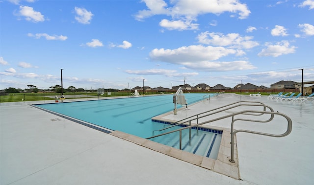 view of pool featuring a patio area