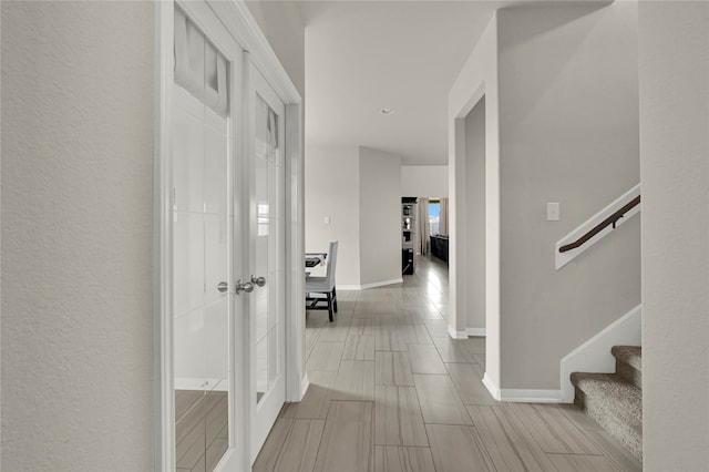 corridor with french doors