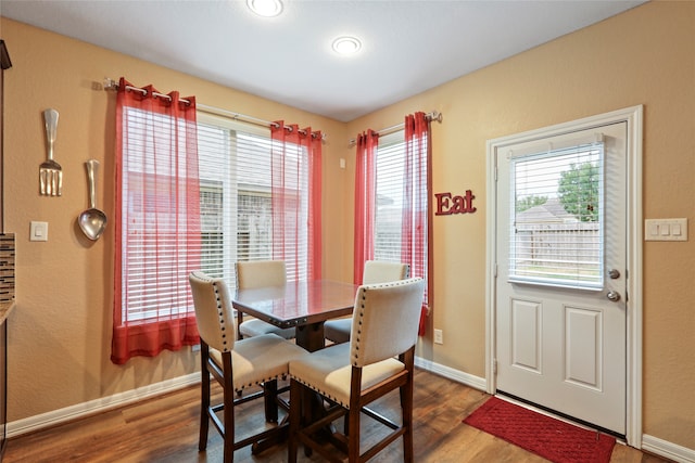 dining area featuring hardwood / wood-style floors