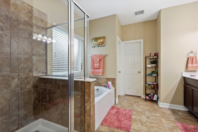 13423 Astley Acres Ln, Cypress, TX 77429 - bathroom with a garden tub, visible vents, and a stall shower