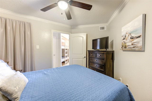 bedroom with crown molding, a textured ceiling, and ceiling fan