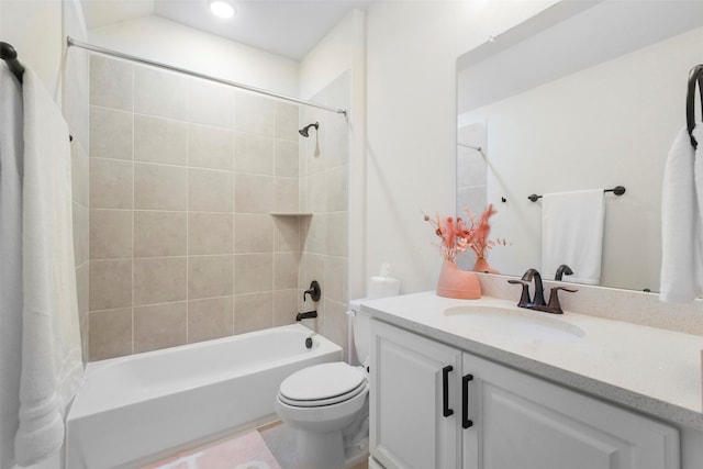 full bathroom featuring shower / tub combo with curtain, vanity, and toilet