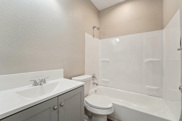 full bathroom featuring  shower combination, toilet, and vanity