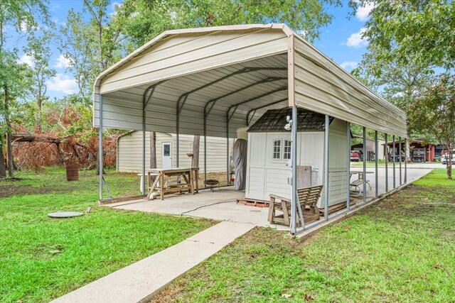 view of parking / parking lot with a lawn and a carport