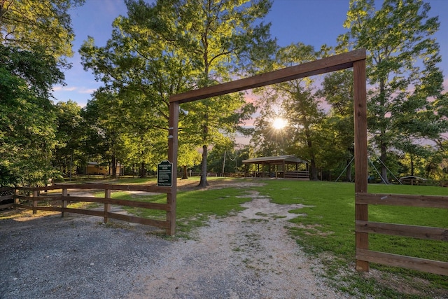 view of property's community with a yard