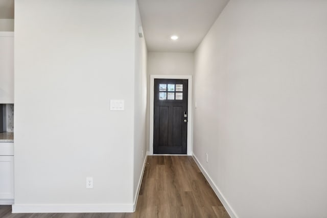 doorway featuring dark hardwood / wood-style flooring