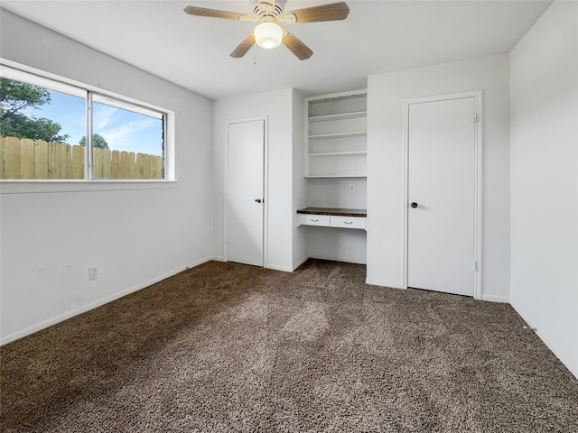 unfurnished bedroom with carpet flooring and ceiling fan