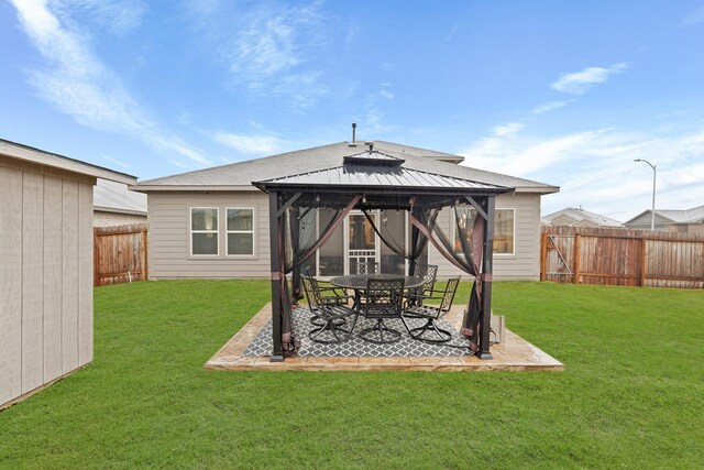 view of yard featuring a patio area and a gazebo