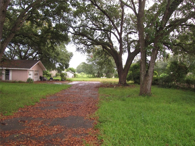 exterior space featuring aphalt driveway