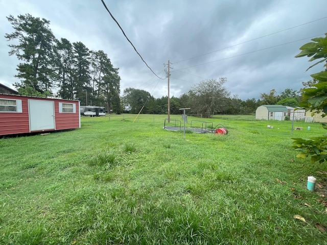 view of yard with a shed