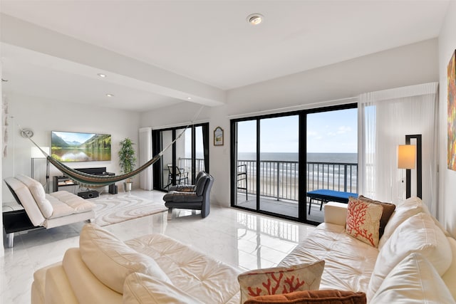 living room featuring a water view