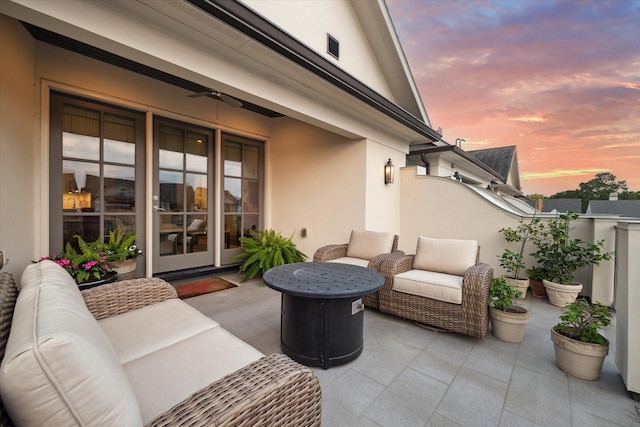 view of patio with ceiling fan and an outdoor hangout area