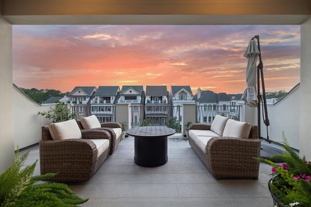 view of patio / terrace featuring an outdoor hangout area and a residential view