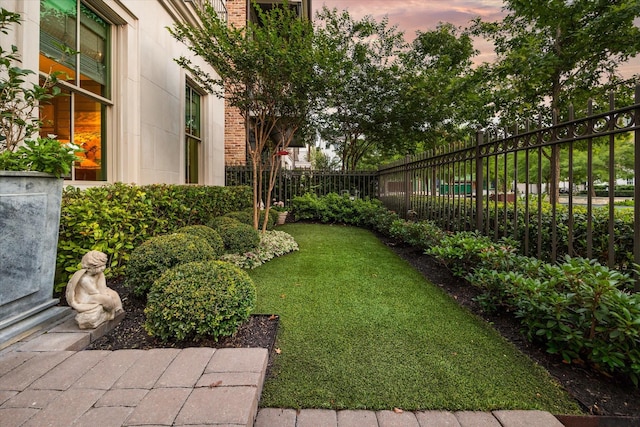 yard at dusk with fence