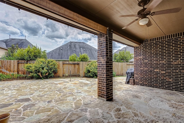 view of patio / terrace featuring a ceiling fan and a fenced backyard