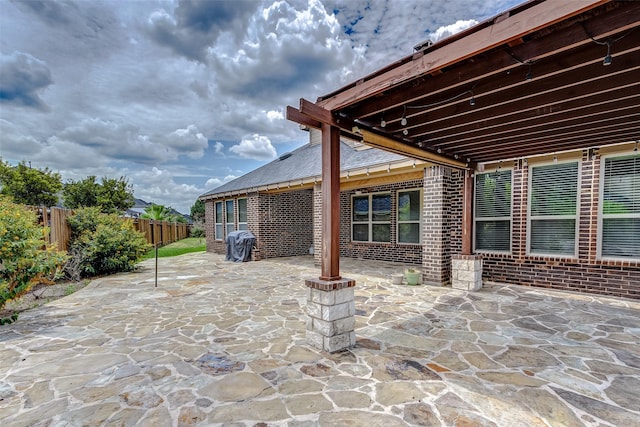 view of patio / terrace featuring area for grilling and fence private yard