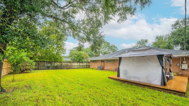 view of yard with a deck