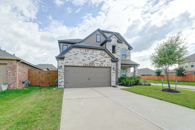 view of front facade with a front lawn and a garage