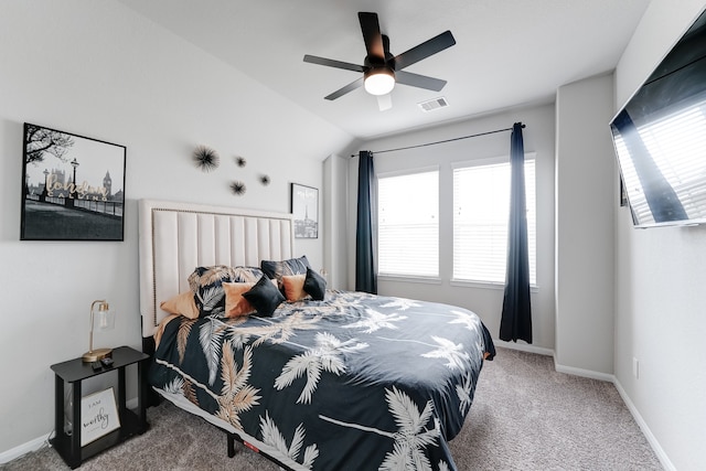 bedroom with vaulted ceiling, carpet floors, and ceiling fan