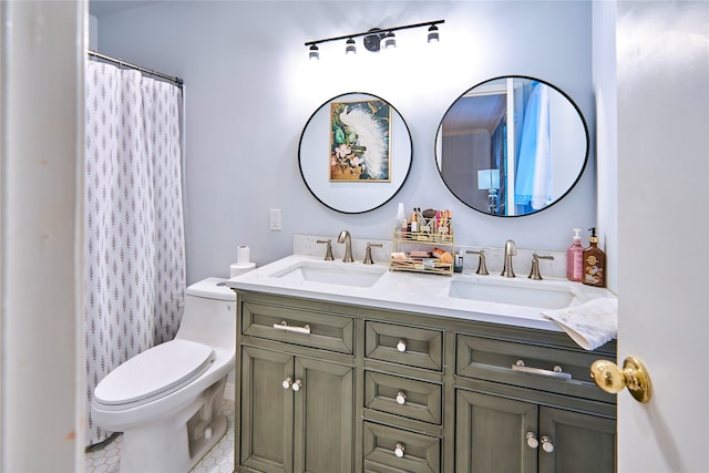 bathroom with tile patterned flooring, vanity, toilet, and a shower with curtain