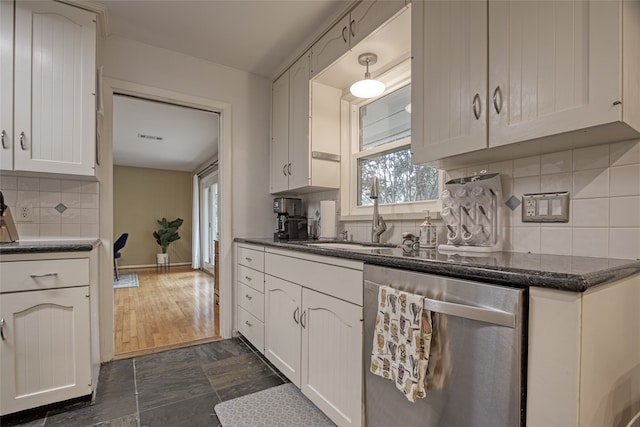 kitchen with dishwasher, dark hardwood / wood-style flooring, white cabinetry, and sink