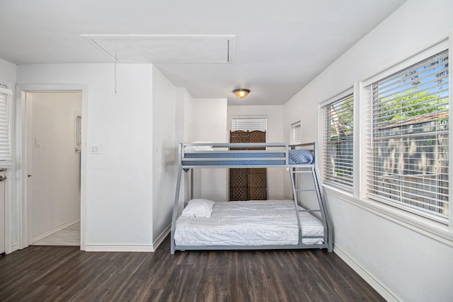 3821 Nasa Rd Unit 1, Seabrook, TX 77586 - bedroom featuring attic access and wood finished floors
