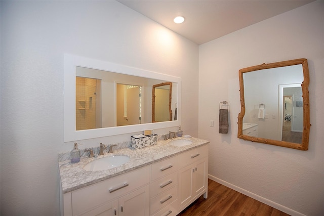 3821 Nasa Rd Unit 1, Seabrook, TX 77586 - bathroom with wood finished floors and double vanity