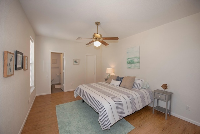3821 Nasa Rd Unit 1, Seabrook, TX 77586 - bedroom featuring light wood finished floors and a ceiling fan
