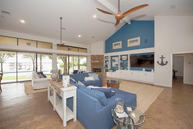 3821 Nasa Rd Unit 1, Seabrook, TX 77586 - living room with high vaulted ceiling, plenty of natural light, a ceiling fan, a stone fireplace, and recessed lighting