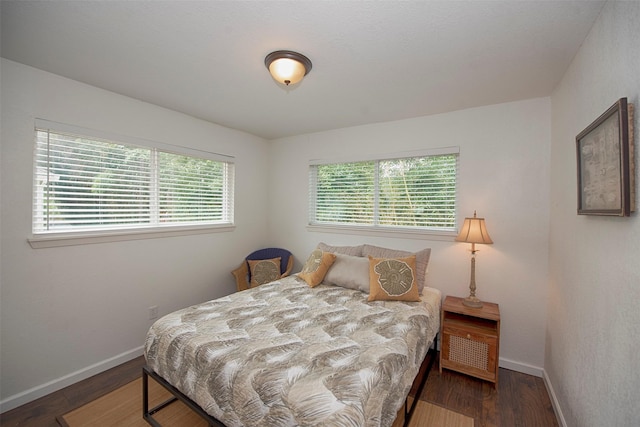 3821 Nasa Rd Unit 1, Seabrook, TX 77586 - bedroom with wood finished floors