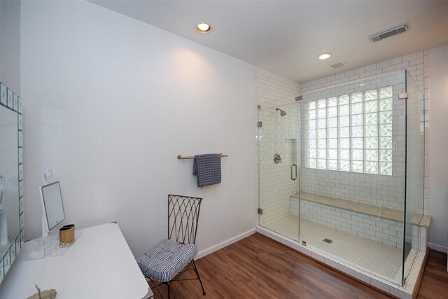 3821 Nasa Rd Unit 1, Seabrook, TX 77586 - bathroom featuring wood finished floors, a shower stall, and recessed lighting