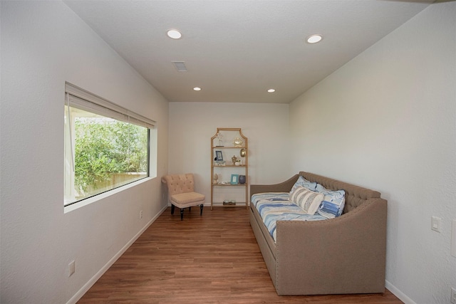 3821 Nasa Rd Unit 1, Seabrook, TX 77586 - living area featuring wood finished floors and recessed lighting