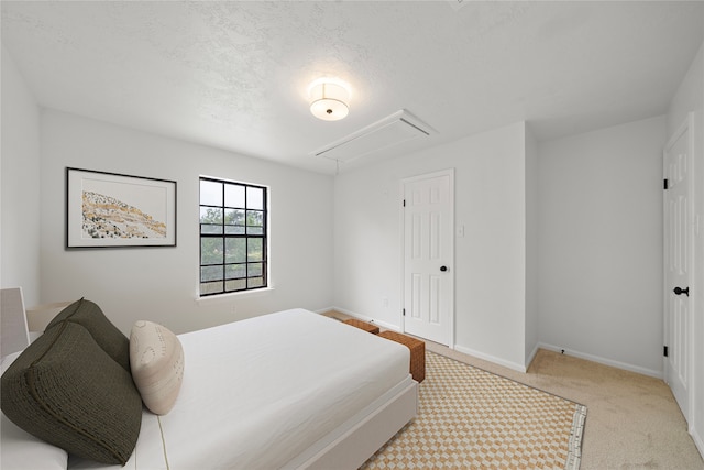 bedroom with light colored carpet